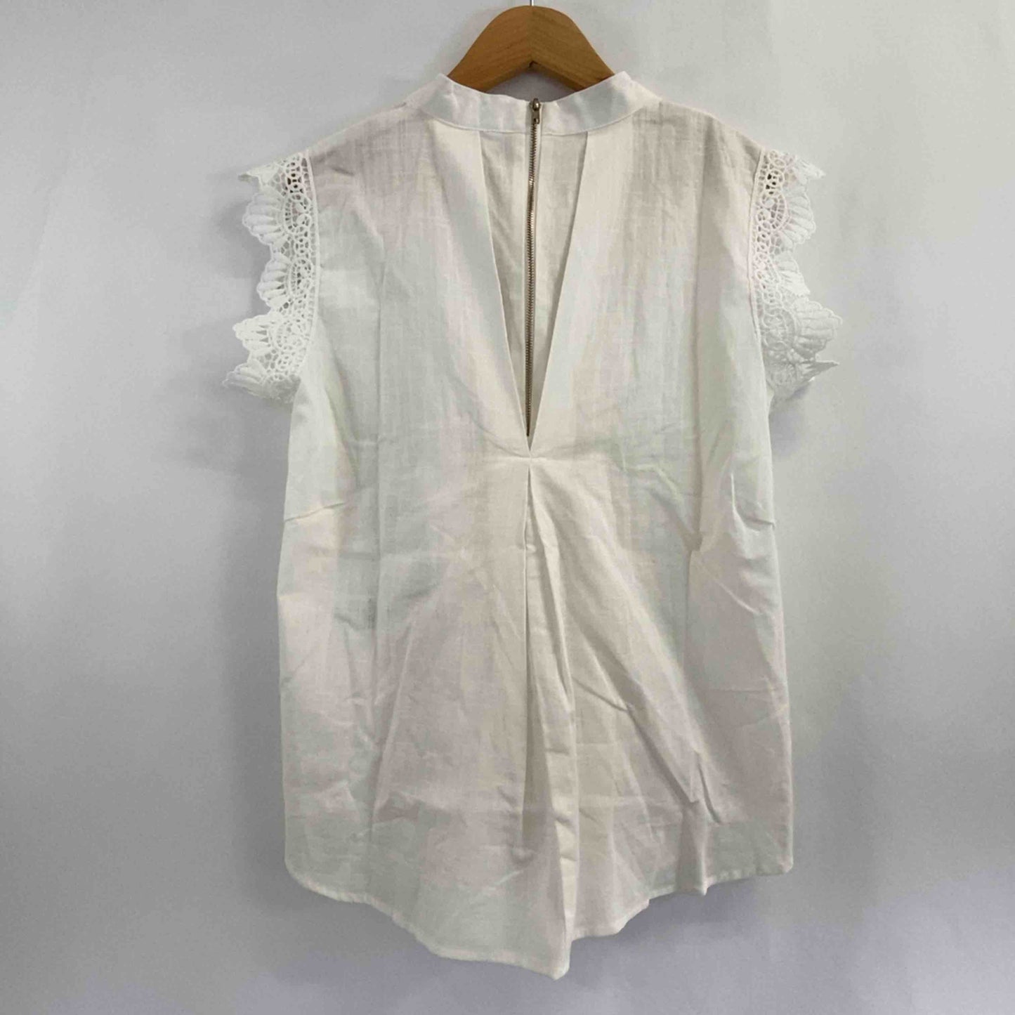 adapt retailing  レディース Tシャツ（袖なし）ホワイト tk