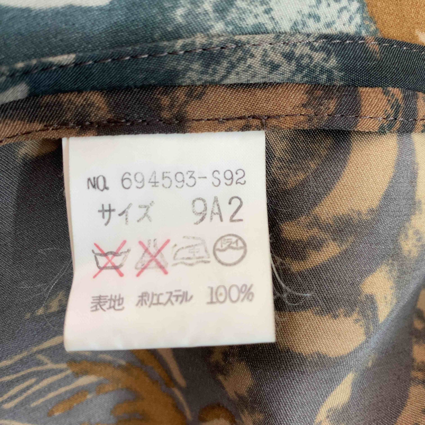 伊太利屋  レディース テーラードジャケット 総柄 ブラウングリーン系