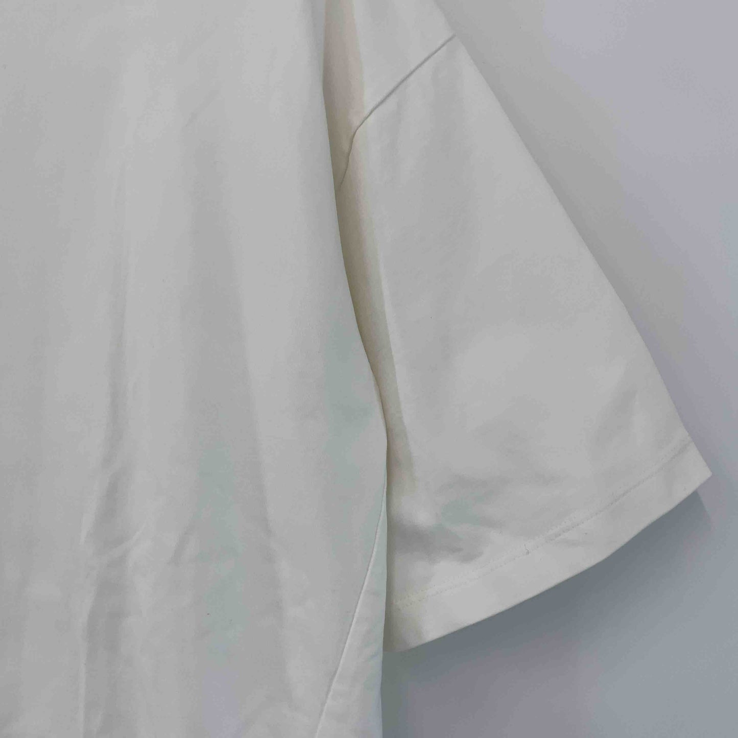 1er Arrondissement プルミエアロンディスモン ホワイト サイドスリット 無地 シンプル レディース Tシャツ（半袖）