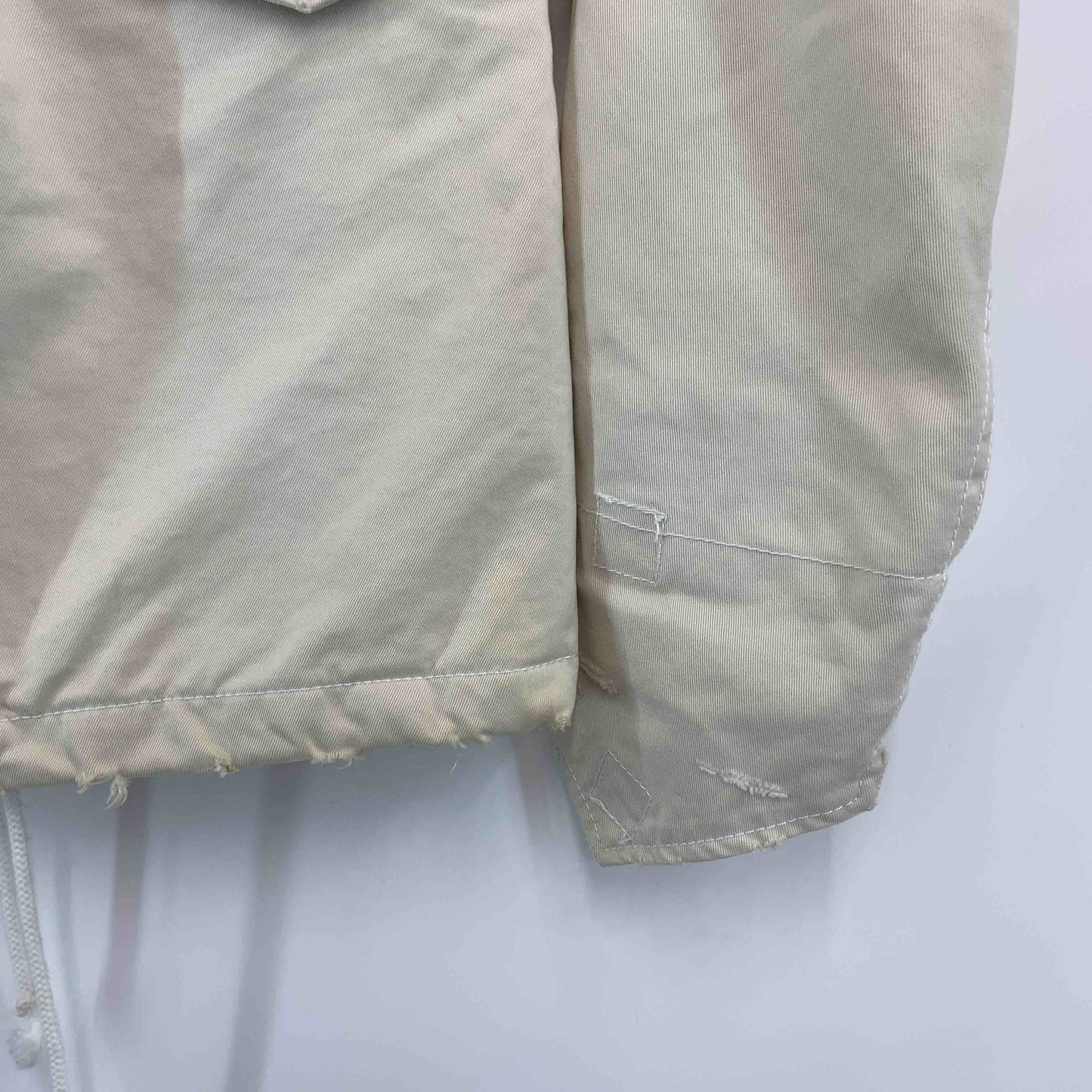 WJK ダブルジェイケイ メンズ ミリタリージャケット ライトベージュ ドローストリング ダメージ加工