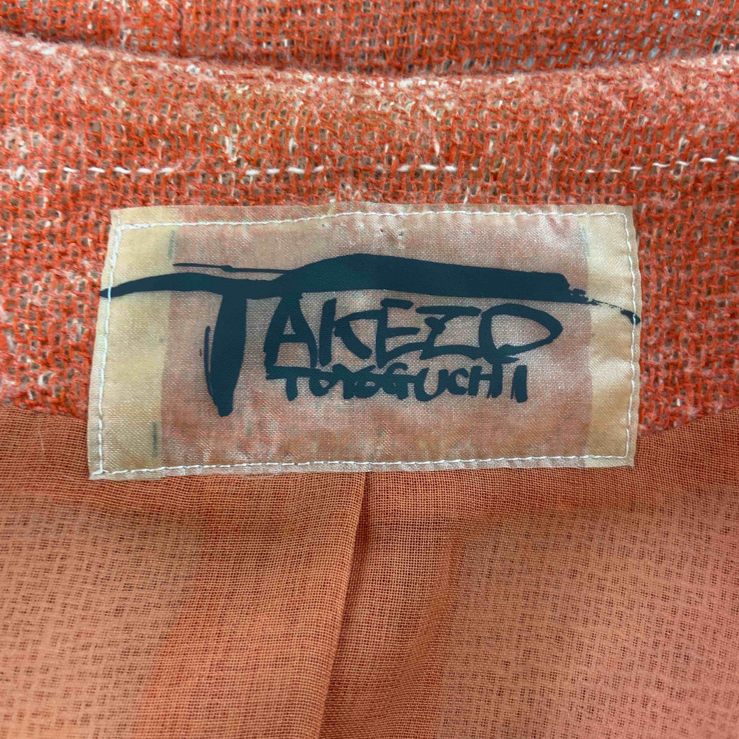 TAKEZO TOYOGUDHI タケゾウ トヨグチ  レディース ノーカラージャケット オレンジ
